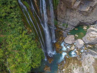 waterfall flowing in nature, cascade, cascade between rocks. Hakkari in Turkey
