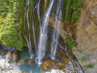 waterfall flowing in nature, cascade, cascade between rocks. Hakkari in Turkey
