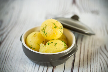 early boiled potato with butter and fresh dill