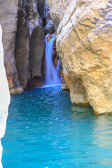 waterfall flowing in nature, cascade, cascade between rocks. Hakkari in Turkey
