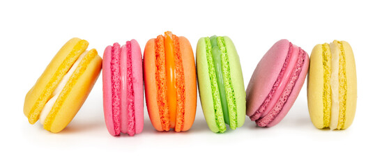 Colorful french macaroons in row