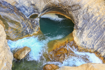 waterfall flowing in nature, cascade, cascade between rocks. Hakkari in Turkey
