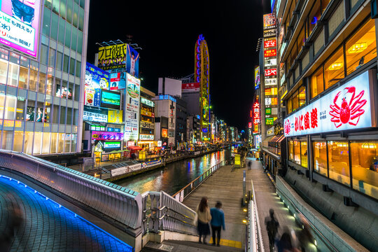 OSAKA,JAPAN-NOVEMBER 17, 2018:Dotonburi,the famous attraction with full of advertising sign and popular Glico Man billboard and canal.A lot of tourist come to shopping at here