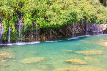 waterfall flowing in nature, cascade, cascade between rocks. Hakkari in Turkey

