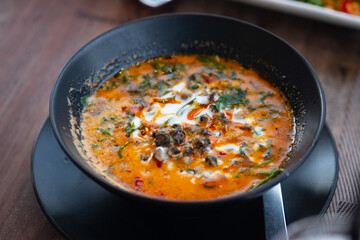 River snail red curry. Thai curry