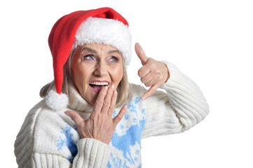 Portrait of smiling happy senior woman in Santa hat