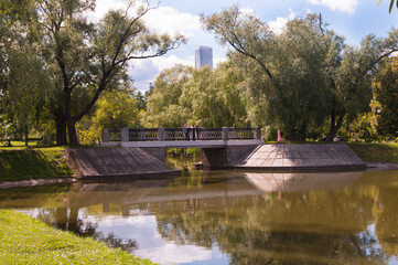 Novodevichy monastery city Park pond bridge old trees autumn September 2020