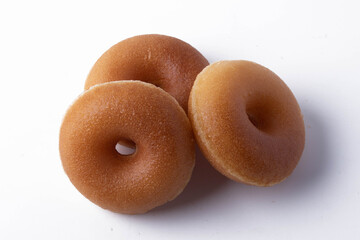 Mini donuts on white background
