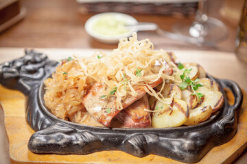 Highly marbled cut of pork with potato and Dorblu cheese	
