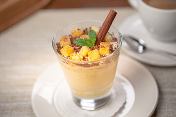 Spicy pumpkin dessert with cream cheese and biscuit	