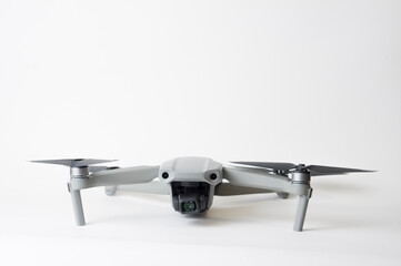 Quadrocopter with camera on white isolated background