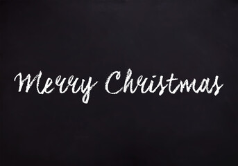 Illustration with Merry Christmas message written on a chalk board