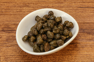 Tasty capers in the bowl