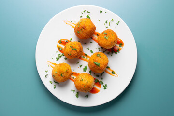 Broccoli croquettes with cheese. Traditional spanish tapa.