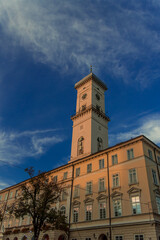 old city town hall architecture building object tower and main campus foreshortening from below vertical picture format in spring morning clear weather time