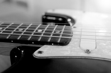 Fototapeta na wymiar Electric guitar macro abstract black and white