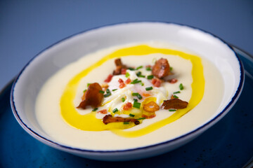 Poached egg with potato cream and mushrooms