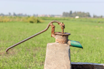 old water pump from earth to the fields