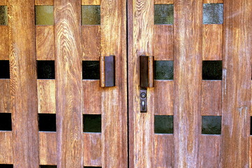 Wooden door entrance to a place of worship.