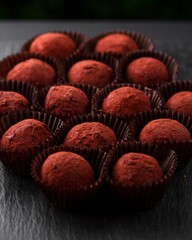 candy cane truffle close-up on a dark background, macro