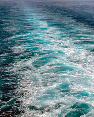 Waves and turbulence from the wake of a boat in the sea as a background