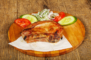 Grilled juicy pork tenderlion steak