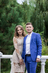 Fototapeta premium Beautiful young couple. Wedding. A family