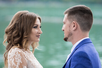 Fototapeta premium Beautiful young couple. Wedding. A family