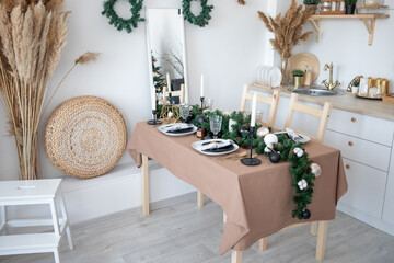 beautiful decorated table for the new year in a bright kitchen