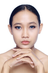 A close up of a beautiful young white girl model in pigtails with blue eyes or blue contact lens and natural makeup