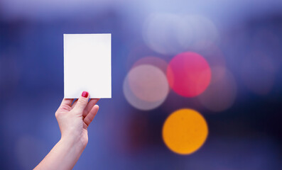 Woman hand holding white card