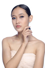 A beautiful young white girl model in pigtails with blue eyes or blue contact lens and natural makeup 