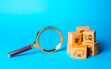 Boxes with goods and magnifying glass. Search for great deals and sales. Holiday sale. Monitoring...