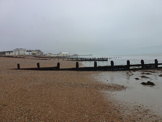 Fototapeta premium A beach on a cloudy wet day