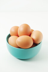 A bowl with chicken eggs