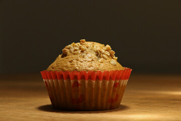 white muffin on a wooden table