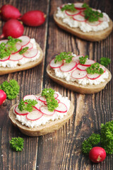 Sandwiches with fresh radishes and cotton cheese	