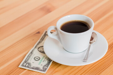 cup of coffee on wooden table