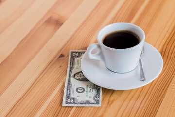 cup of coffee on wooden table