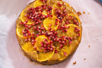 Orange and  pomegranate citrus cake with syrup