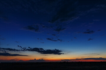 Clouds in the sky at dawn. Morning twilight in summer.