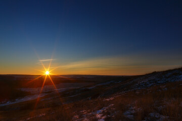 Sun at sunset in early winter.