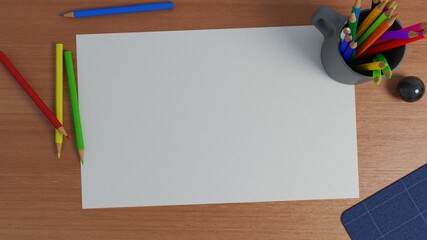 blank paper and colored pencils on the desk