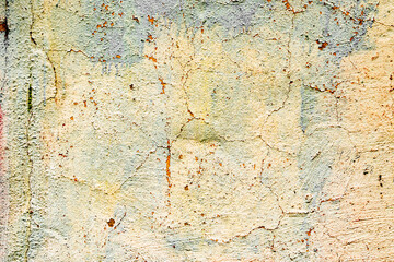 Texture of a concrete wall with cracks and scratches which can be used as a background
