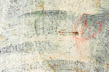 Texture of a concrete wall with cracks and scratches which can be used as a background