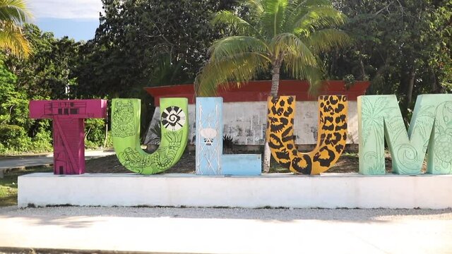 Shot Moving Towards Big Tulum Sign and Then Spinning Around with Palm Trees