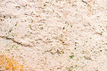 Texture of a concrete wall with cracks and scratches which can be used as a background