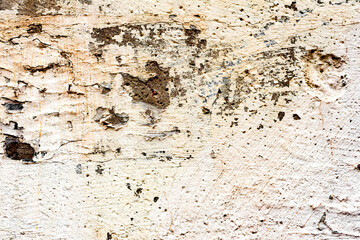 Texture of a concrete wall with cracks and scratches which can be used as a background