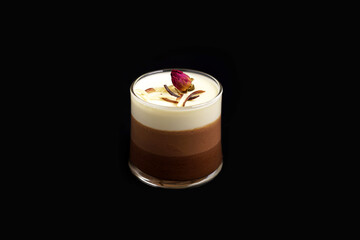 Chef's dessert with chocolate and flower decor