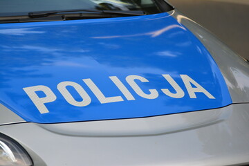 Napis policja na samochodzie.  © FotoDax